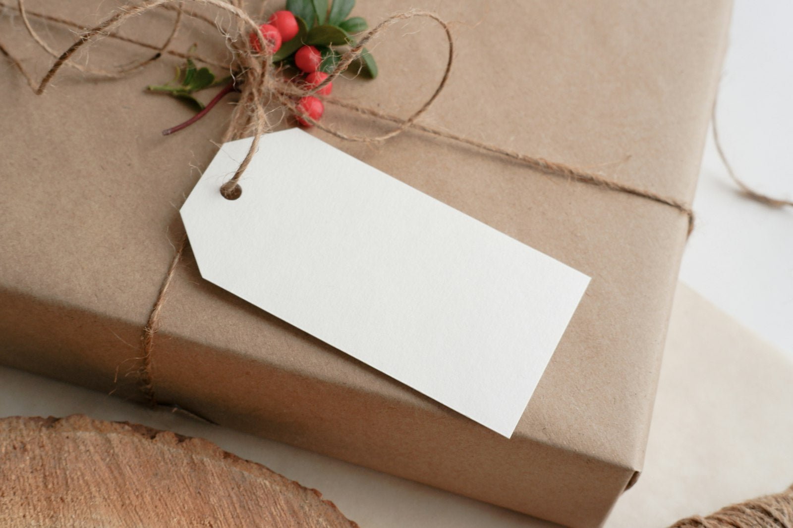 A parcel wrapped in brown paper and tied with twine